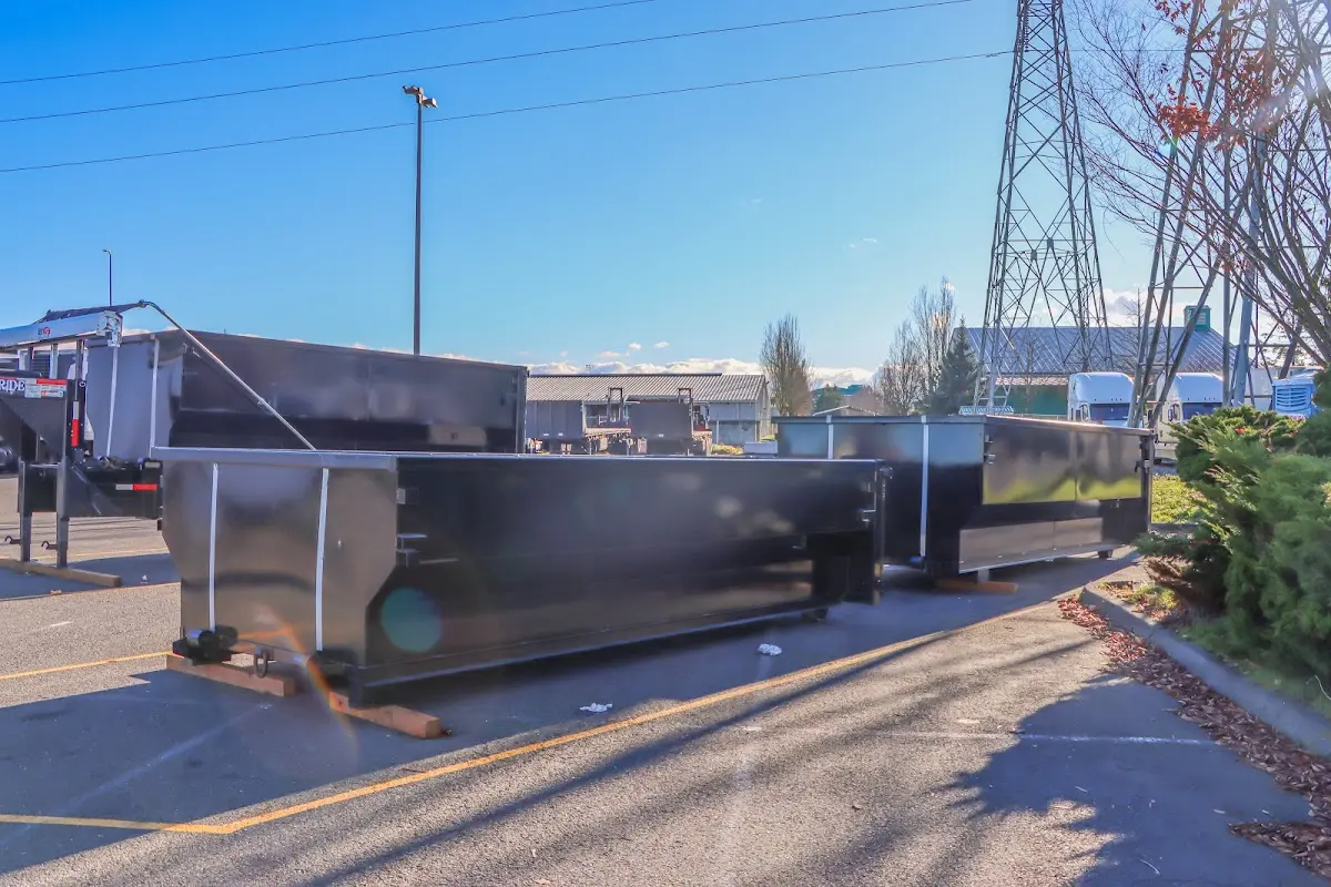 Roll-off dumpster ready for waste disposal at job site for Demolition Dumpster Rental in Sand Lake